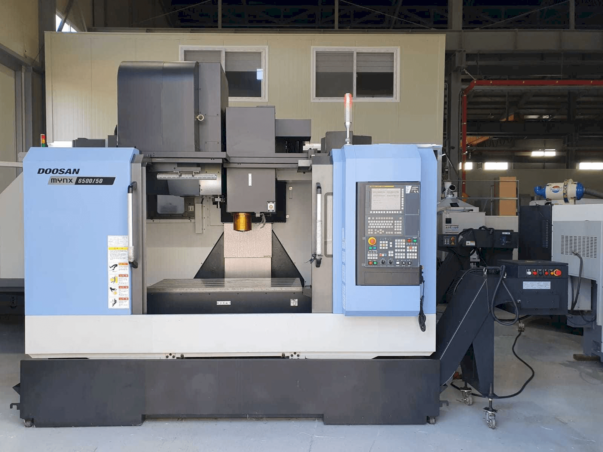 Vooraanzicht van Doosan Mynx 6500/50 machine