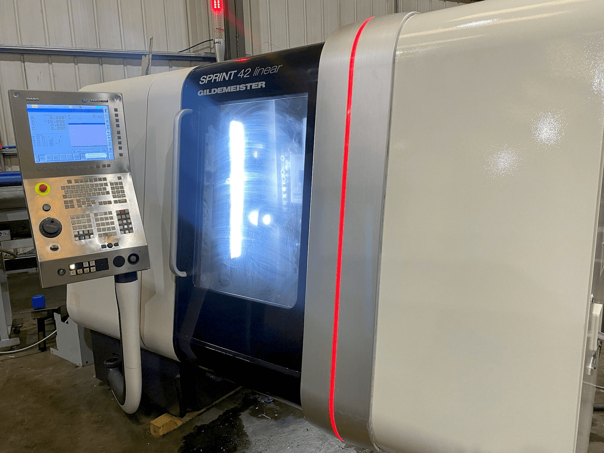 Vooraanzicht van DMG GILDEMEISTER SPRINT 42 linear machine