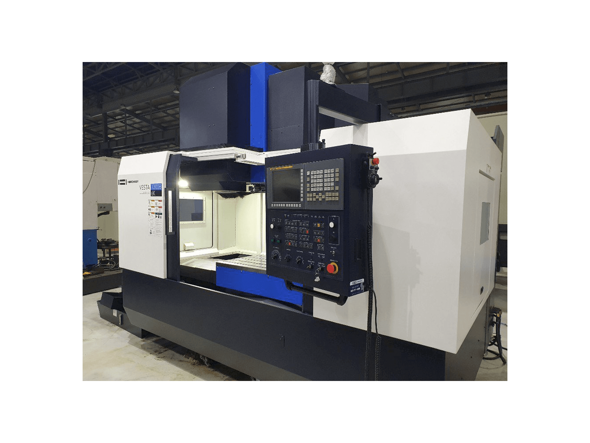 Vooraanzicht van HWACHEON VESTA-1300B machine