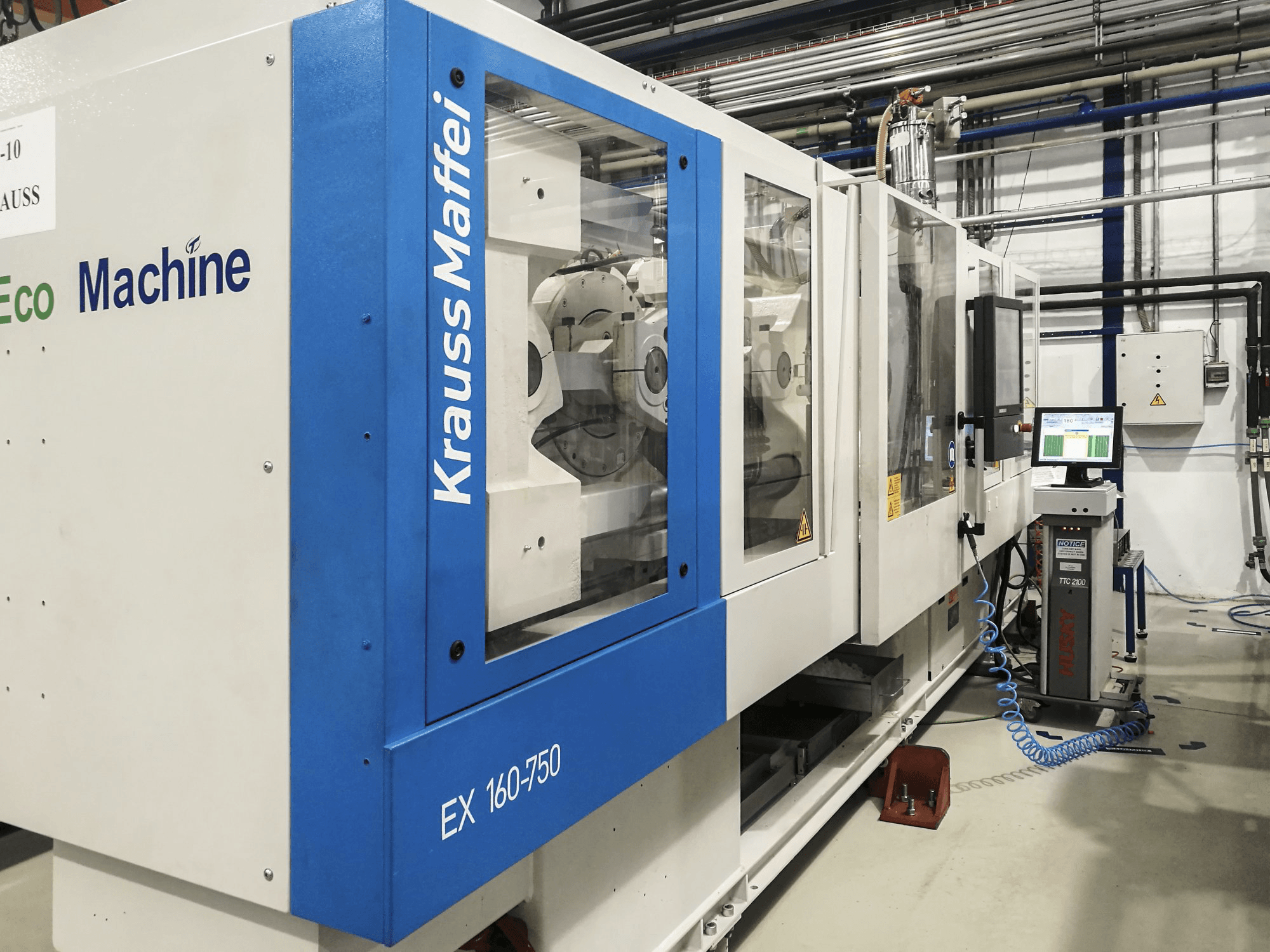 Links zicht van Krauss Maffei 160-750 EX machine