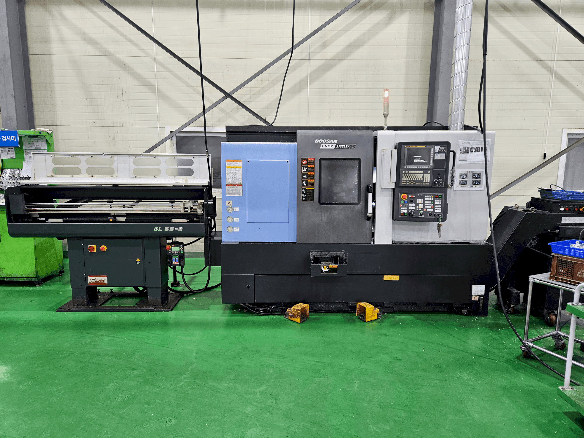 Vooraanzicht van DOOSAN LYNX 2100 LSYB machine