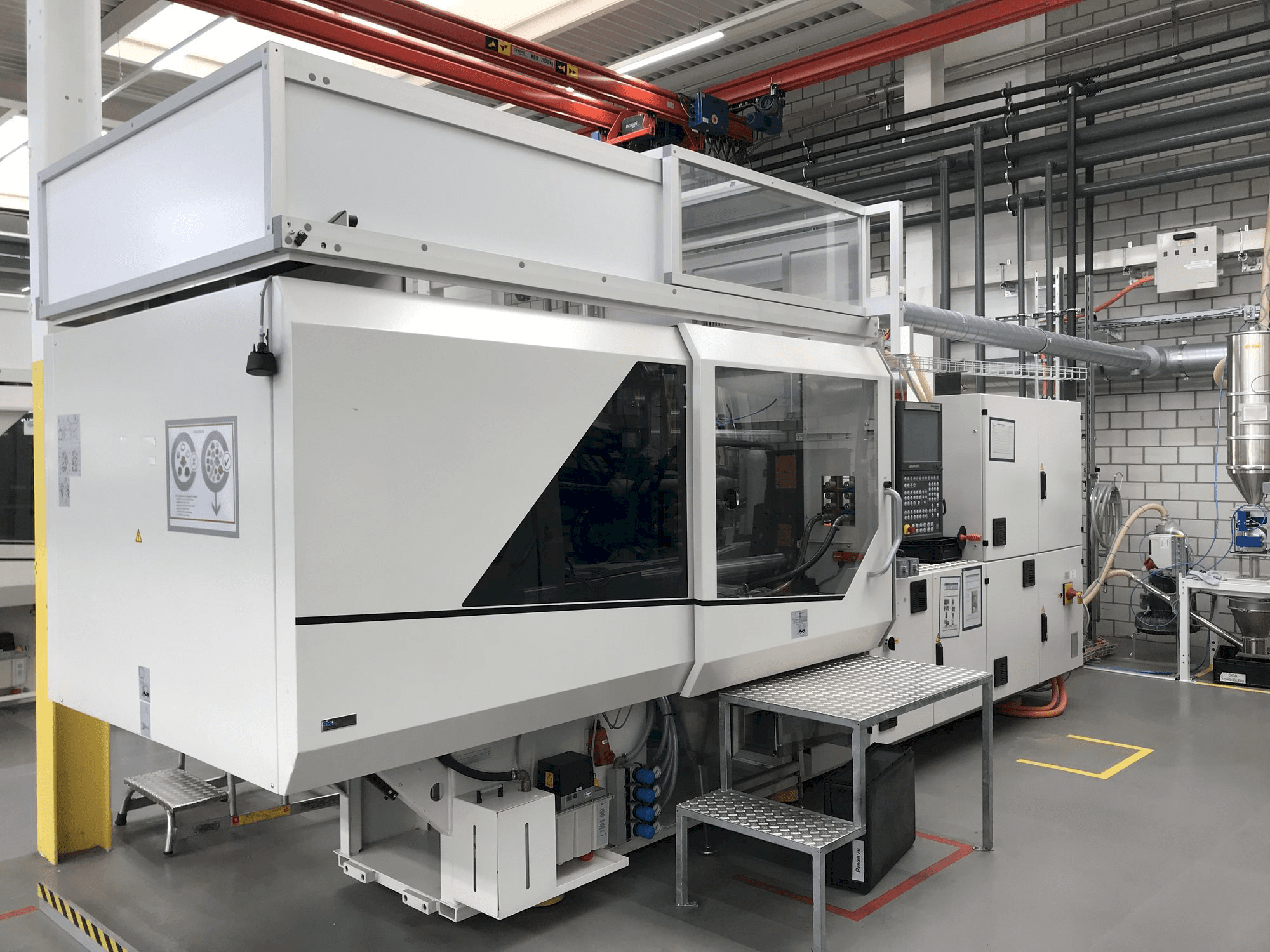 Linkerzijdeaanzicht van Sumitomo Demag EL-EXIS SP 150/500-475 machine