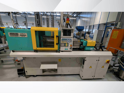 Arburg 270 S 400-60 hydraulische spuitgietmachine in vooraanzicht, met bedieningspaneel en veiligheidselementen.