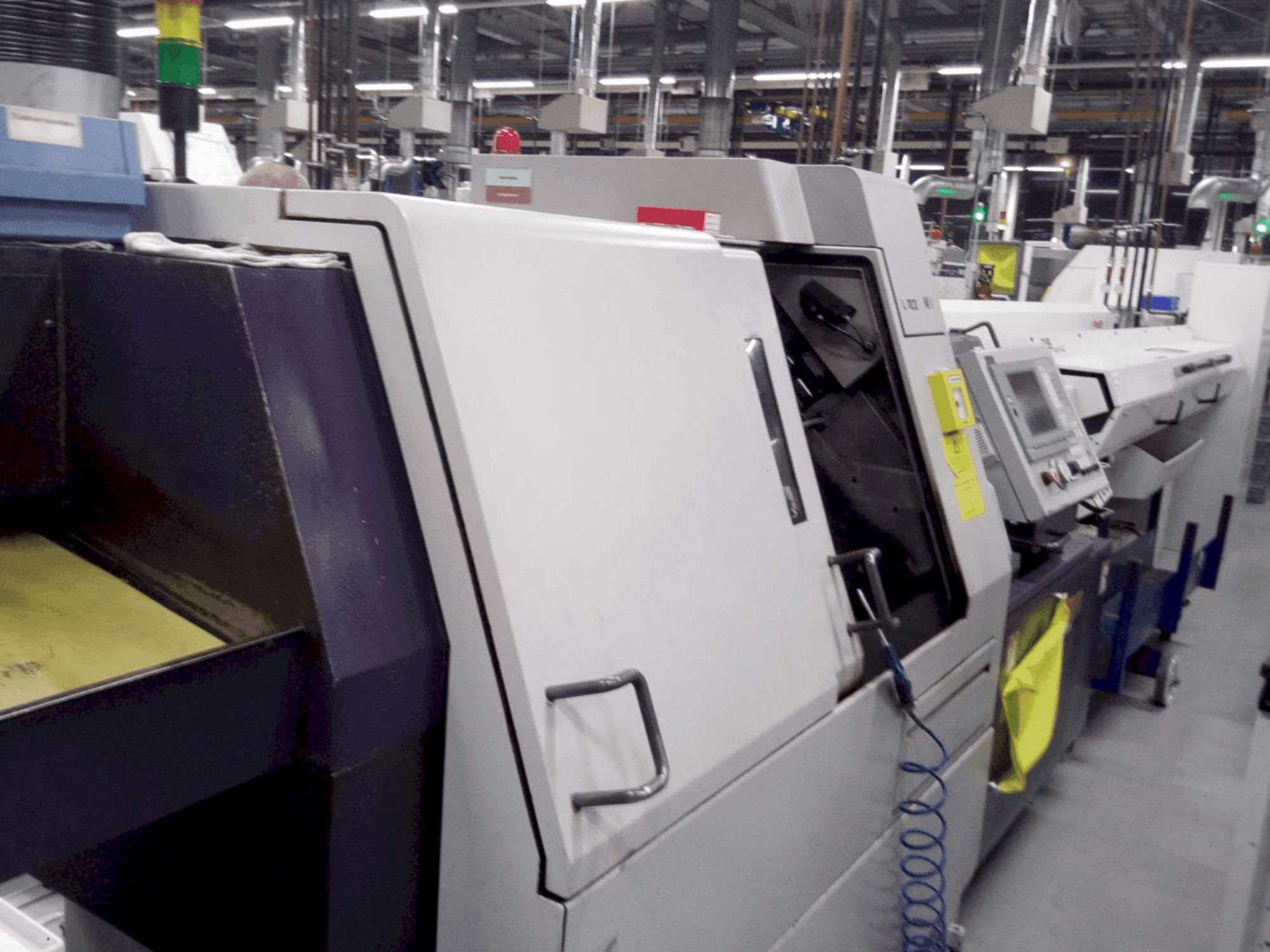 Vooraanzicht van Citizen M32 machine