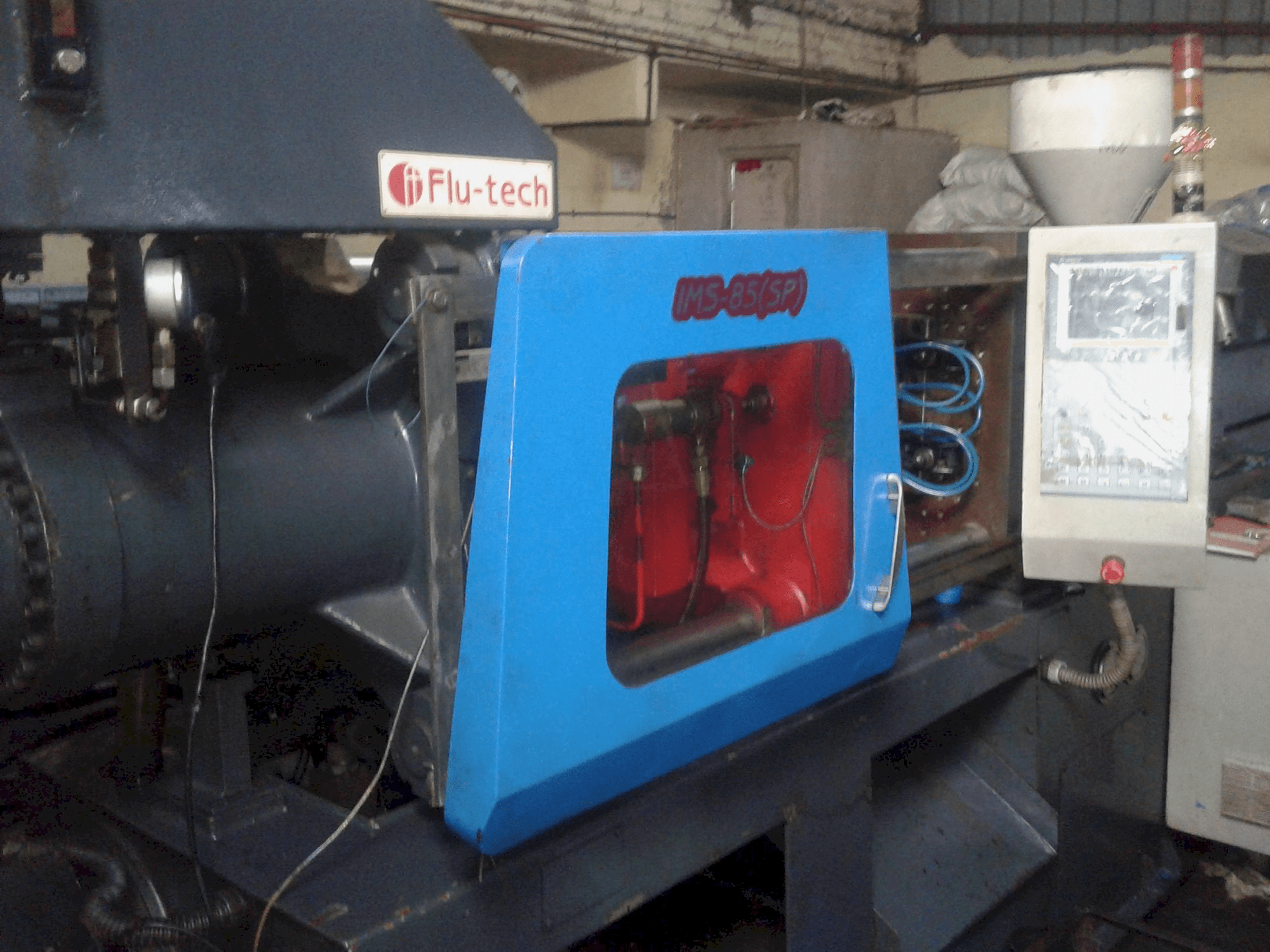 Links zicht van Flu-tech IMS 85 machine