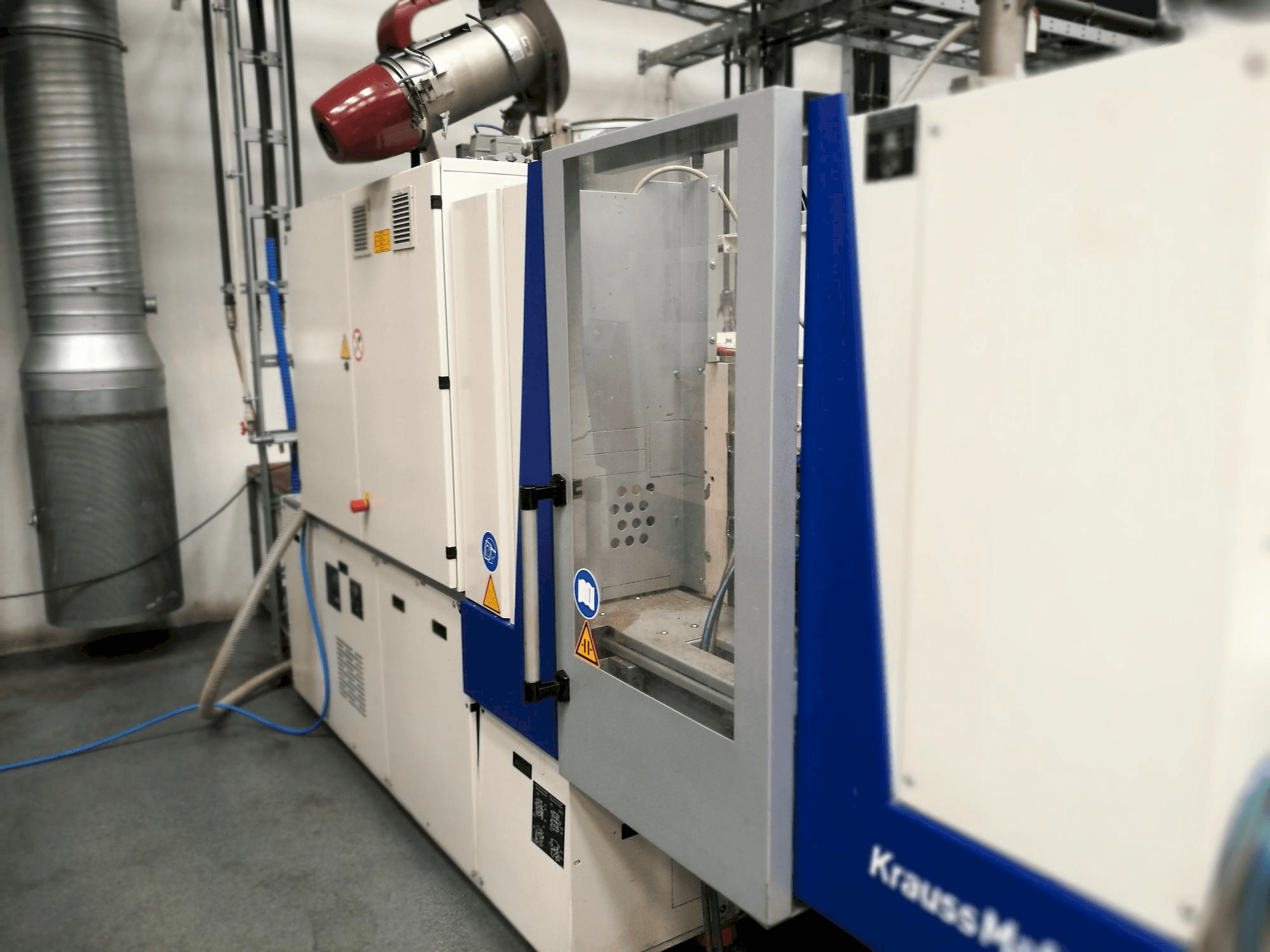 Vooraanzicht van Krauss Maffei KM 35-55 CX machine