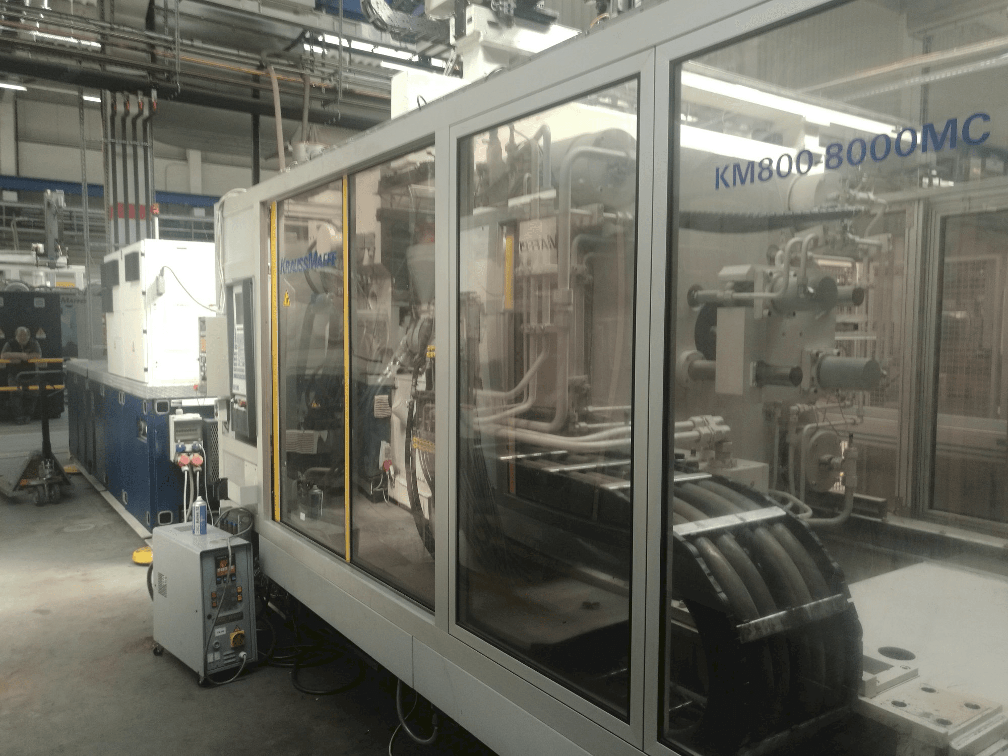 Vooraanzicht van Krauss Maffei 800-8000 MC machine