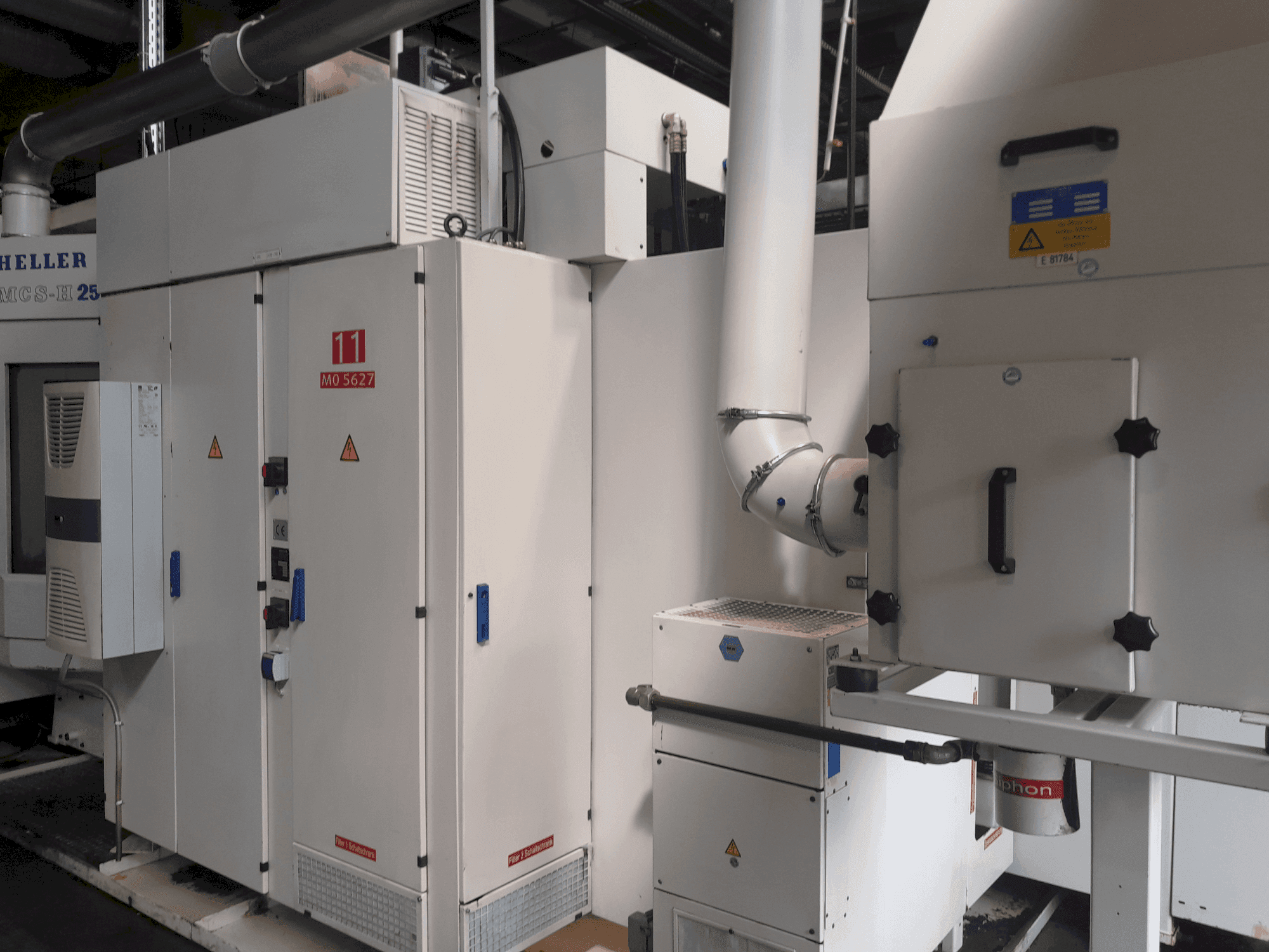 Zijaanzicht van HELLER MCS-H 250 machine
