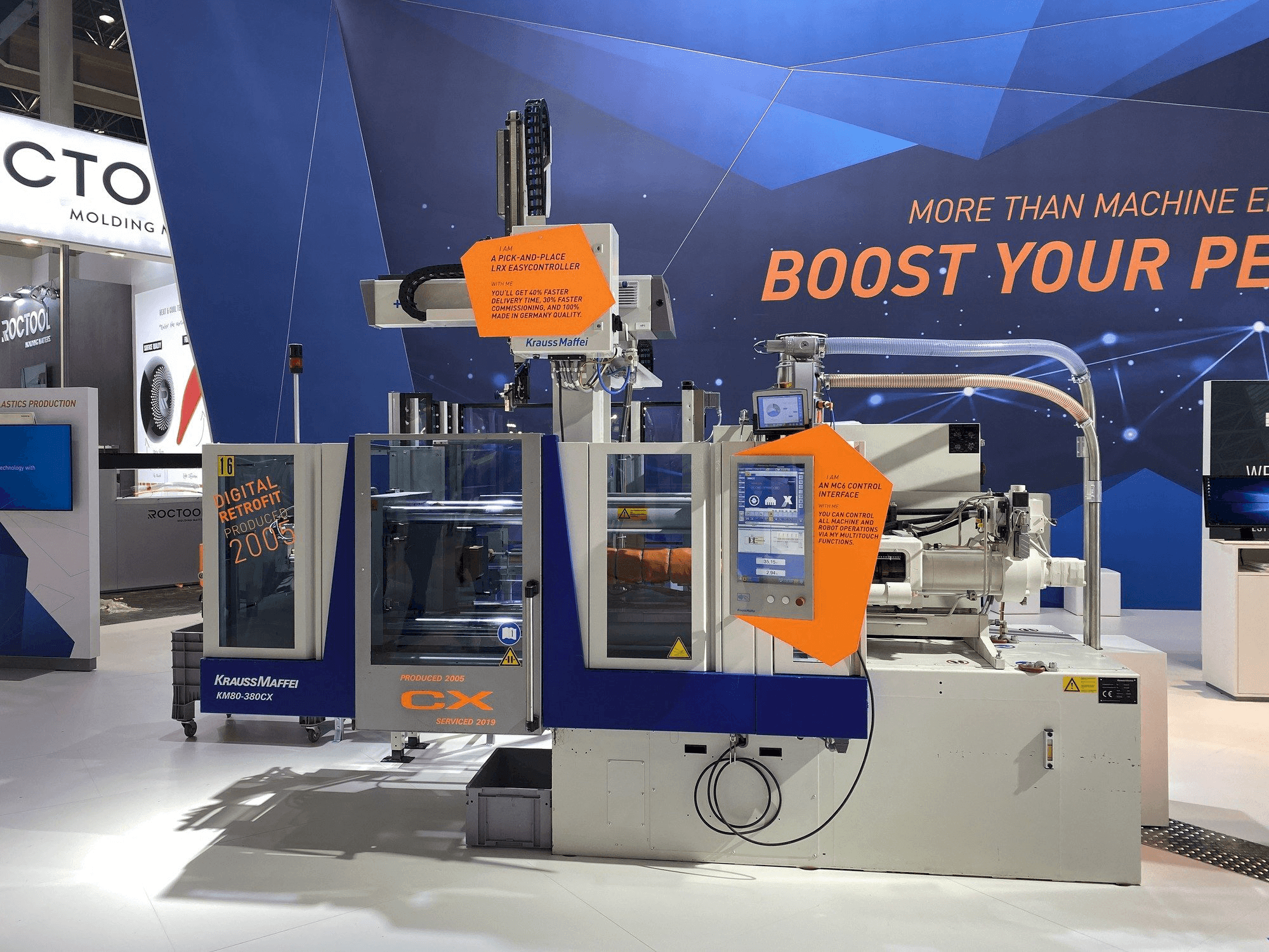 Vooraanzicht van Krauss Maffei 80-380 CX + LRX easyControl 100 machine