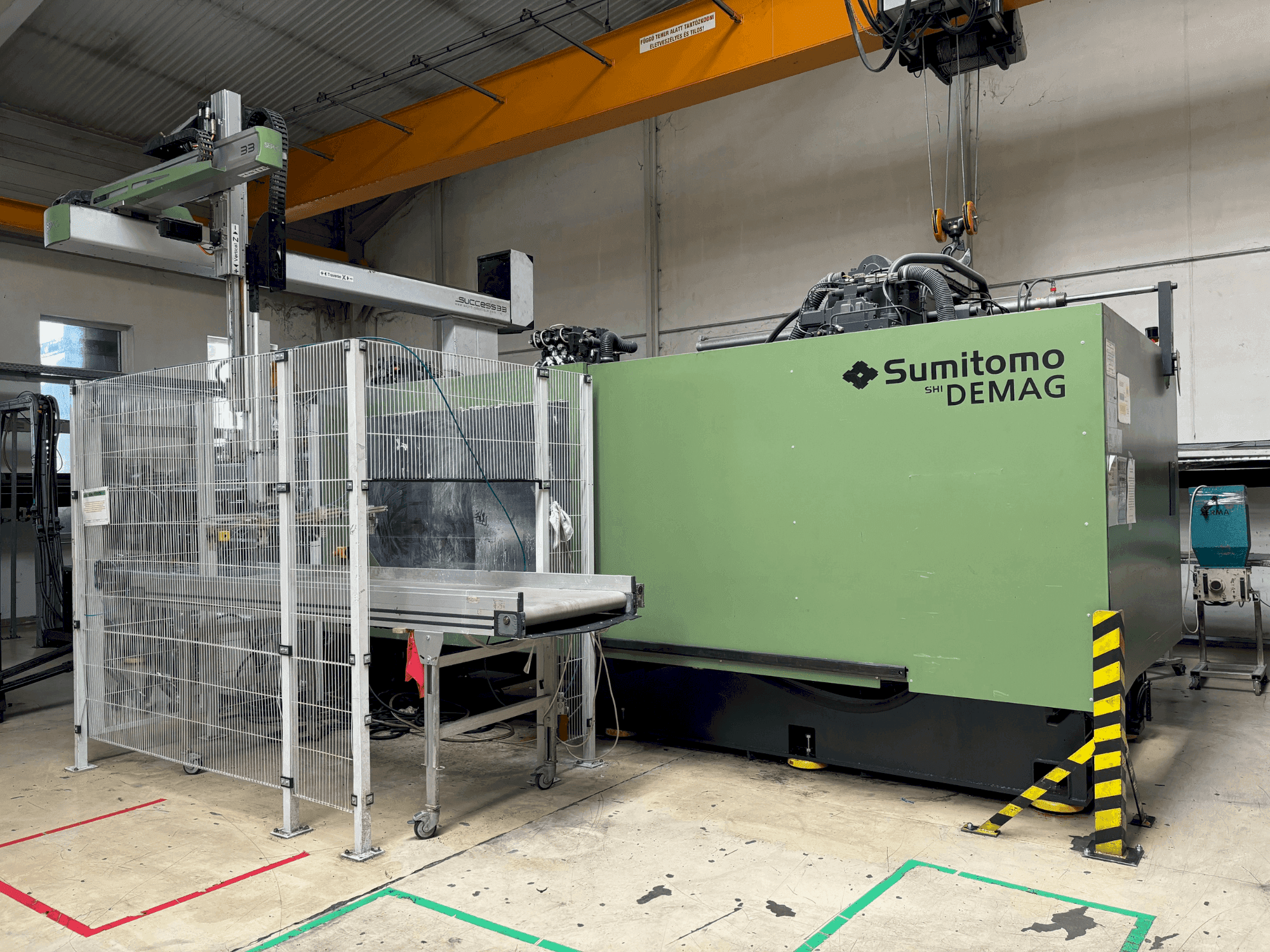 Vooraanzicht van SUMITOMO SHI DEMAG Systec 800/1120-6400 machine