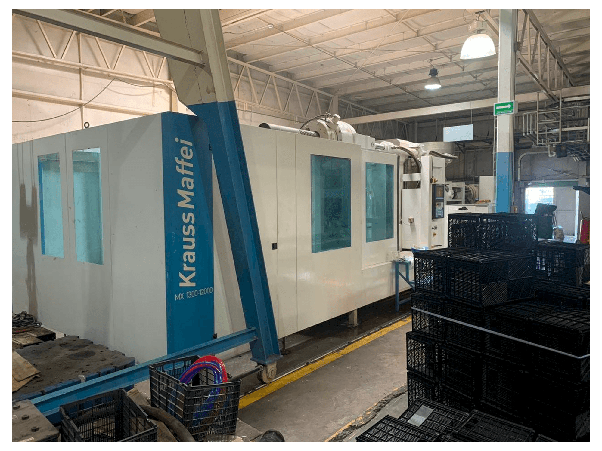 Vooraanzicht van Krauss Maffei 1300-12000 MX machine