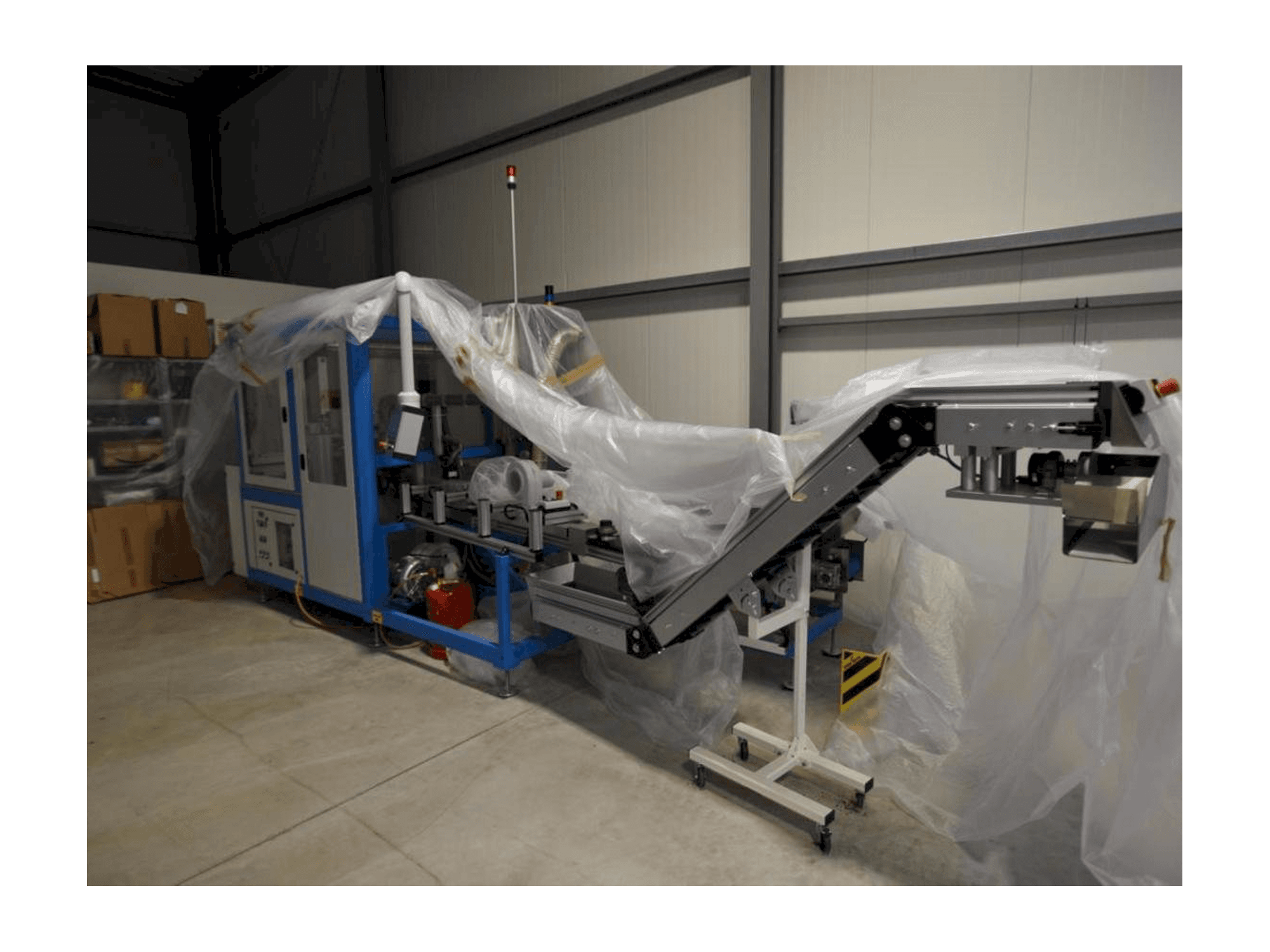 Linkerzijdeaanzicht van TAMPOPRINT Closure Print C machine