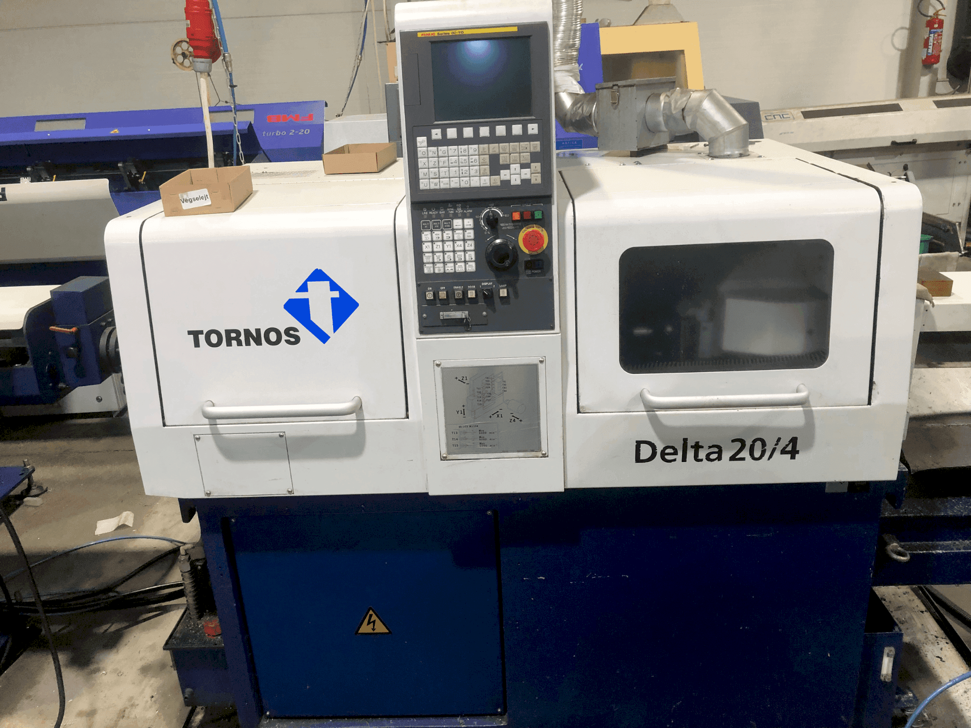 Vooraanzicht van TORNOS TORNOS DELTA 20/4 machine