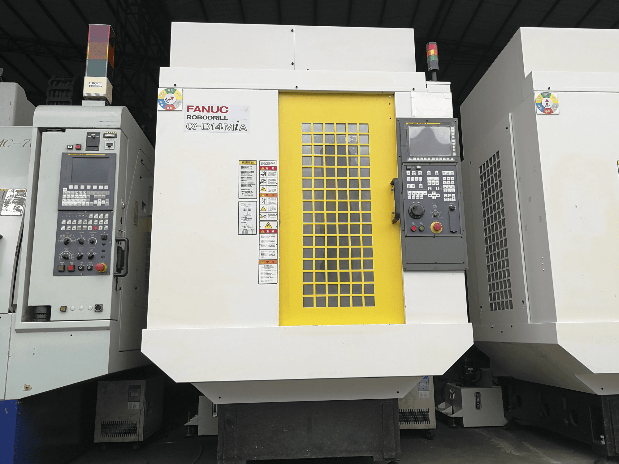 Vooraanzicht van FANUC α-D14MiA machine