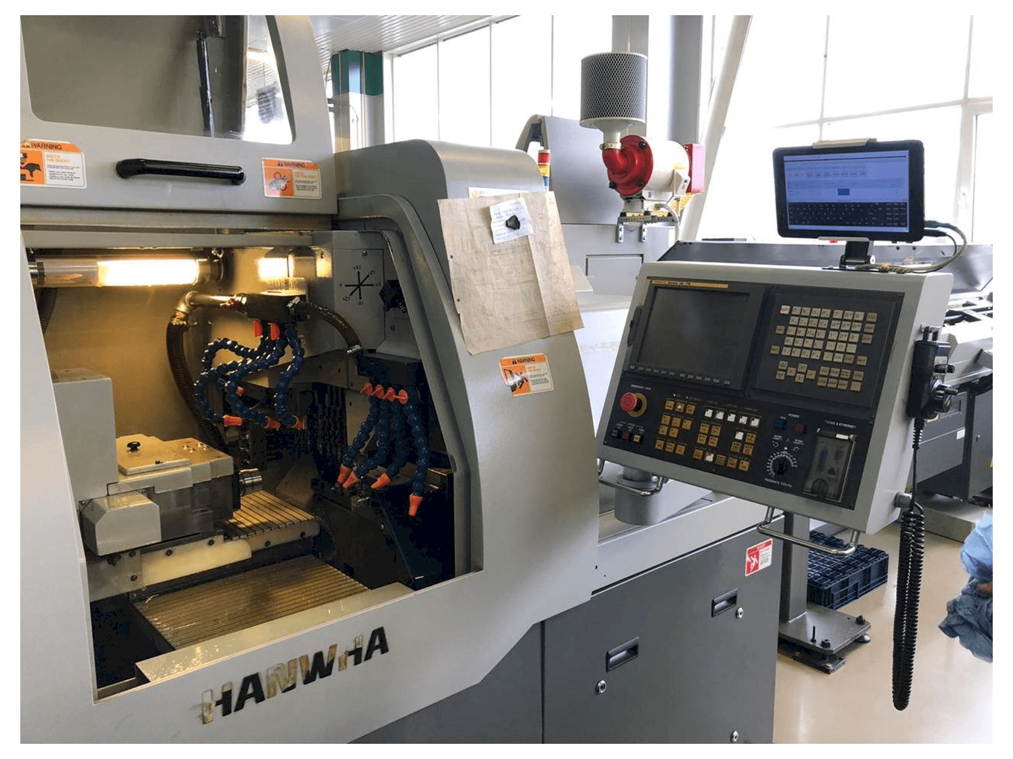 Vooraanzicht van Hanwha XD20H machine