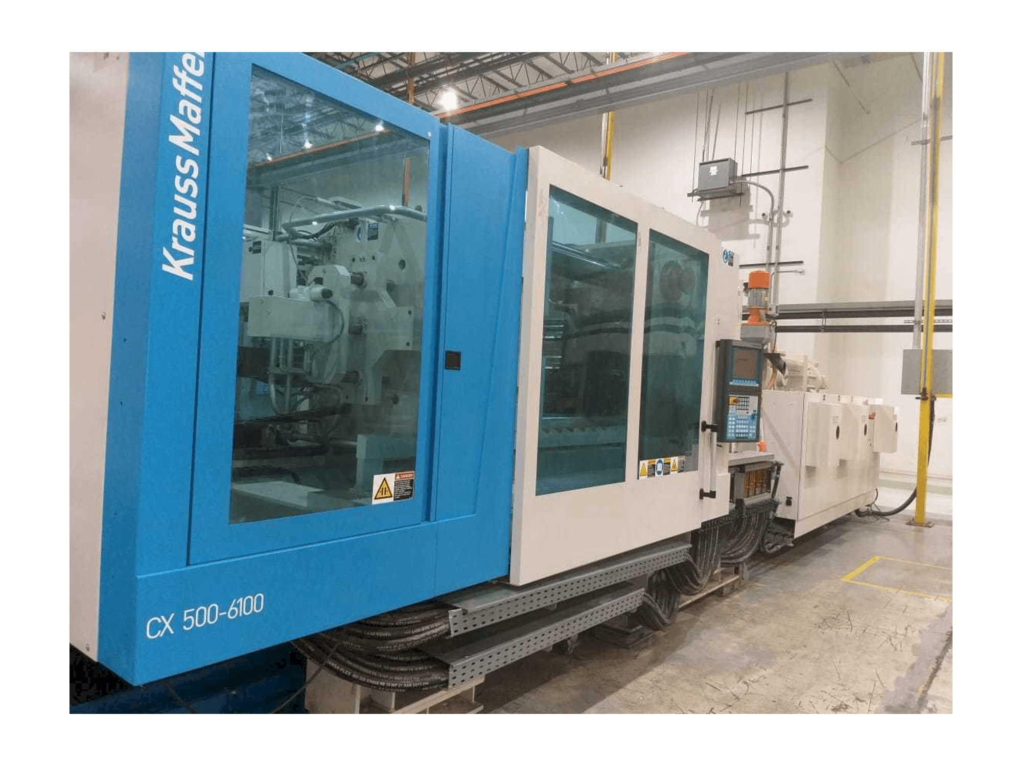 Vooraanzicht van Krauss Maffei 500-6100 CX machine